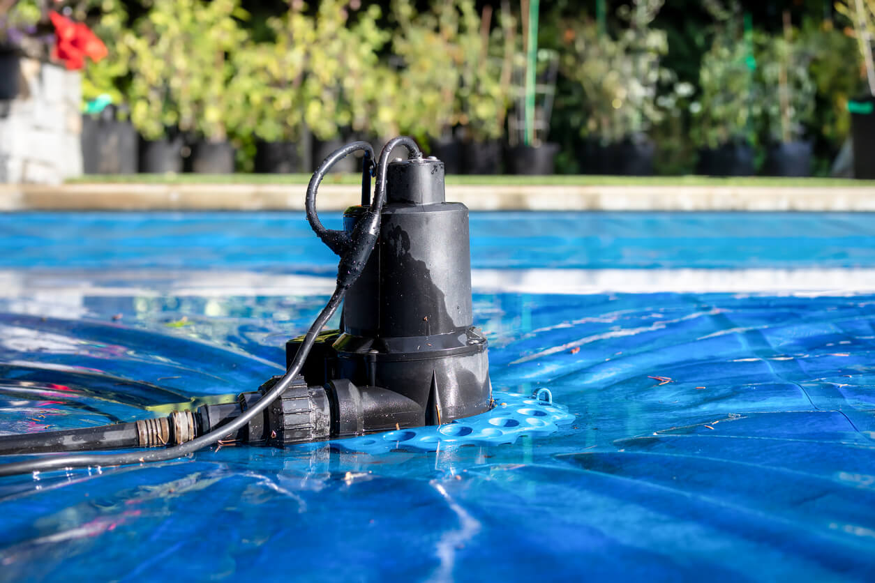 Perspective View of Black Pool Cover Pump for Keeping the Water Away From Pool Covers or Spas. 