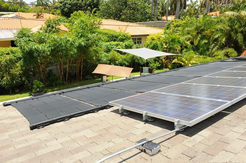 Two Renewable Energy Technologies On Residential Roof Solar PV And Passive Solar Pool Heater