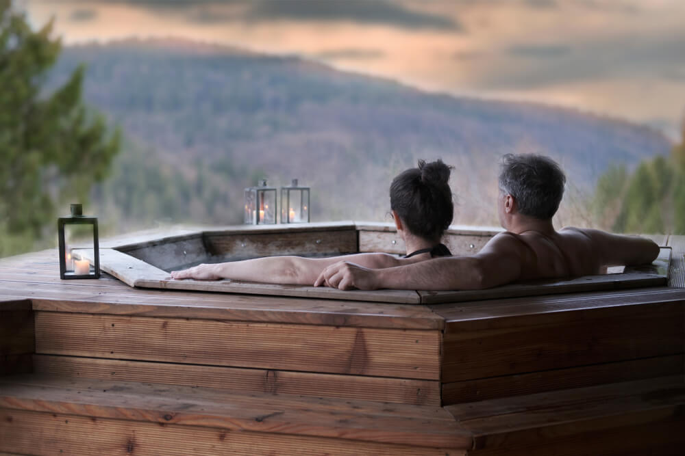 The Young Couple in an Open-air Bath With a View of the Mountains.